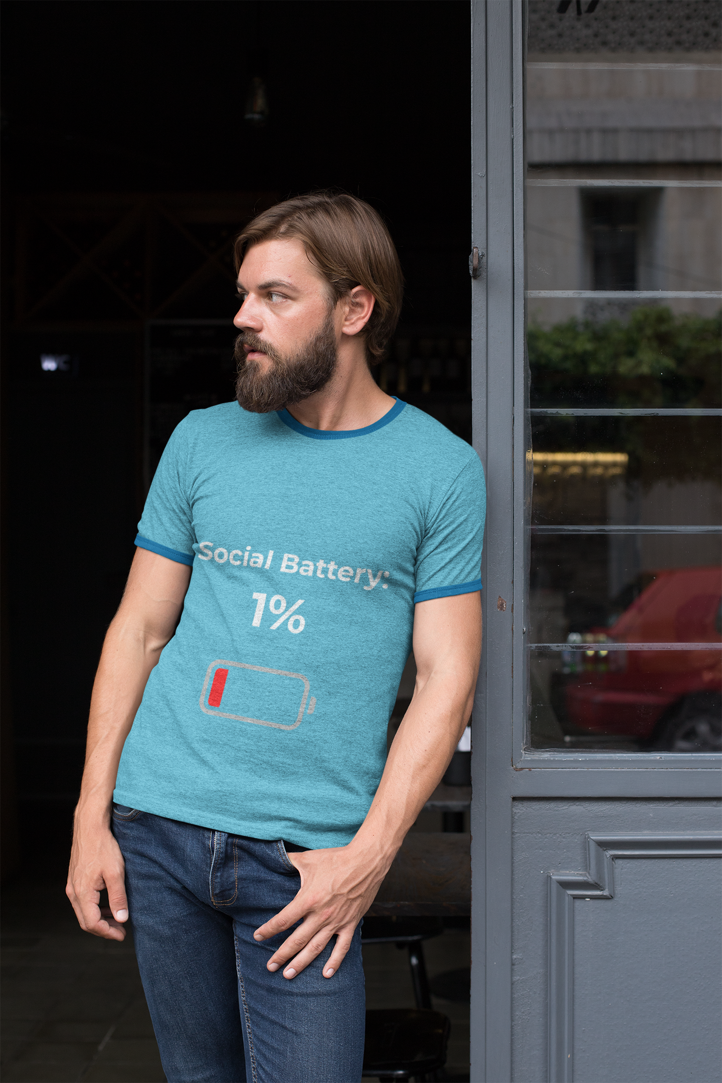 Model wearing Social Battery 1% introvert t-shirt – funny slogan shirt for low energy and mood expression