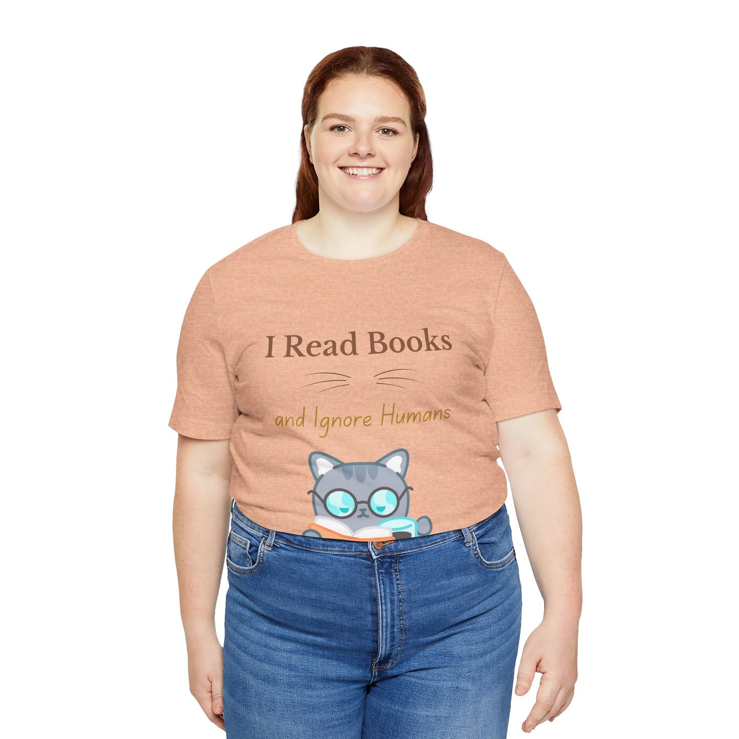 Unisex t-shirt featuring a cat reading a book with the text "I Read Books and Ignore Humans